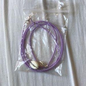 Matching purple necklace and bracelet